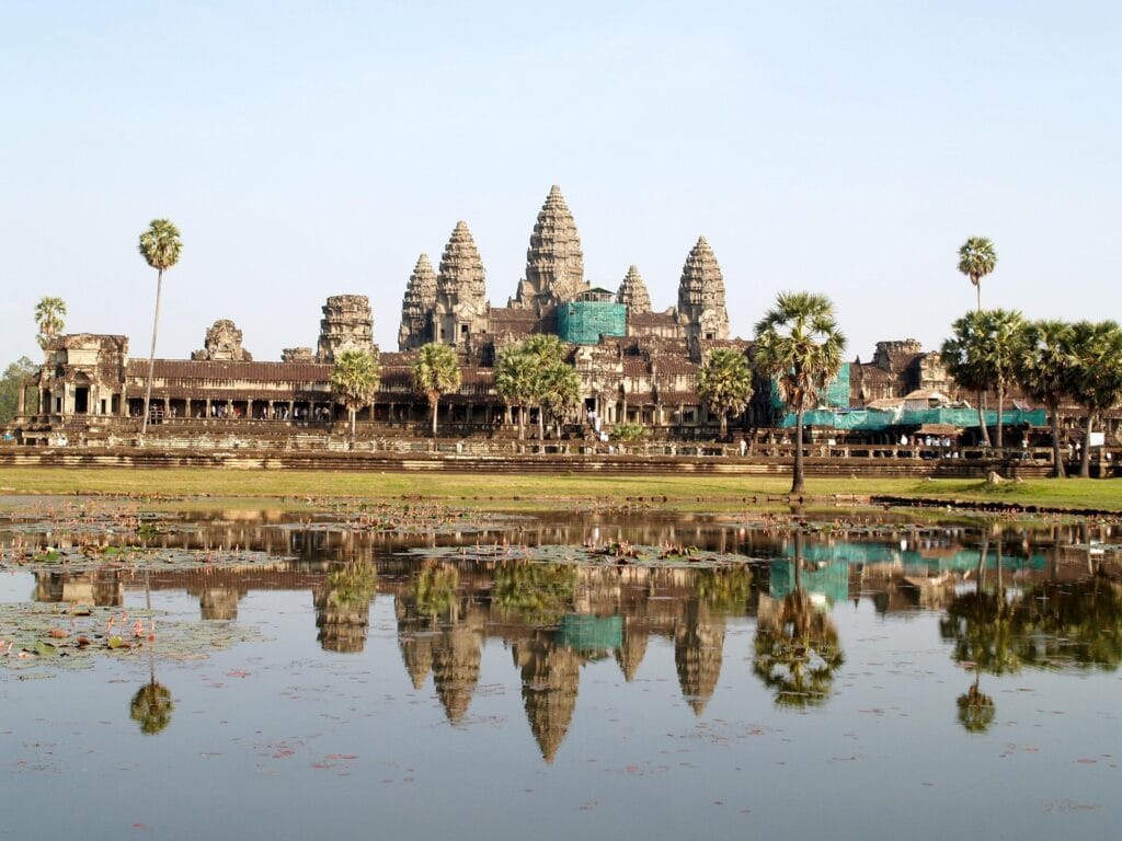 Angkor Wat temple with its iconic towers surrounded by a tranquil moat in Siem Reap, Cambodia