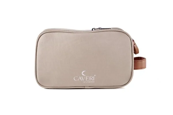 Neutral-toned sand toiletry bag by Caveri, featuring minimalist aesthetic and spacious compartments