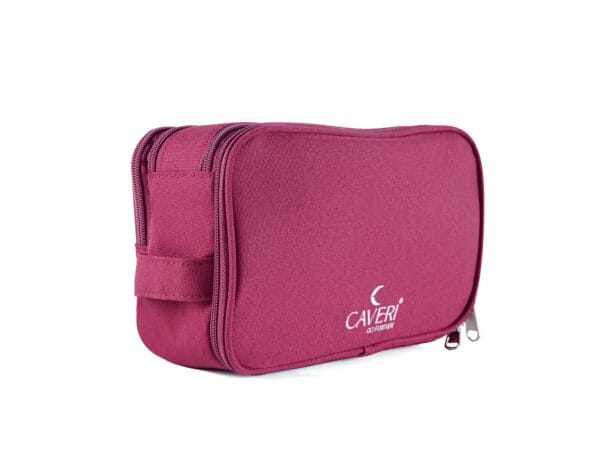 Caveri’s fuchsia travel toiletry bag with minimalist design and waterproof lining