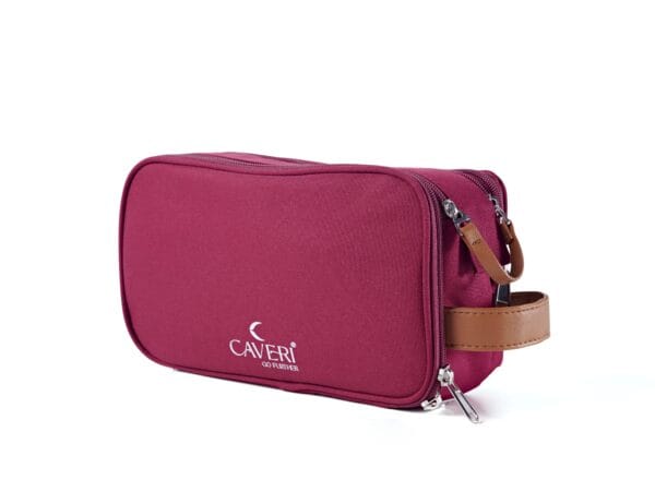 Caveri’s fuchsia travel toiletry bag with minimalist design and waterproof lining