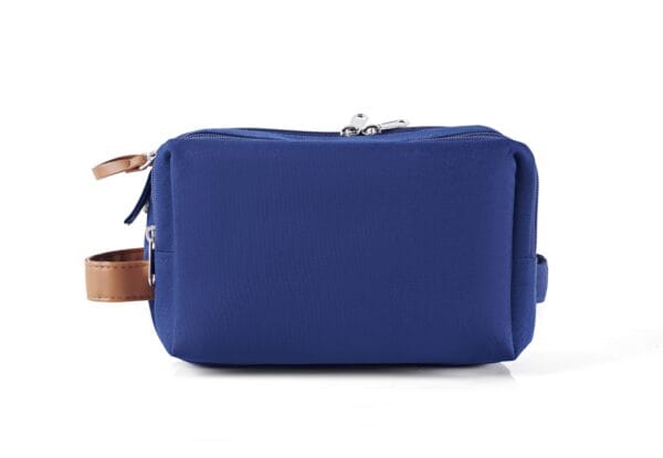 Caveri’s ink blue toiletry bag with sleek silhouette and durable zippers