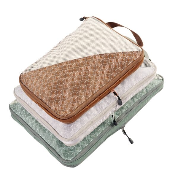 luxury compression bags, designer travel organizers, sustainable luxury packing,