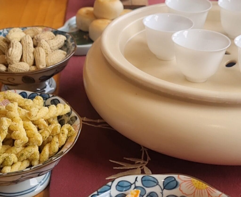 Traditional Chaozhou tea ceremony snacks preserved tangerine osmanthus cake watergrown peanuts Teochew delicacies