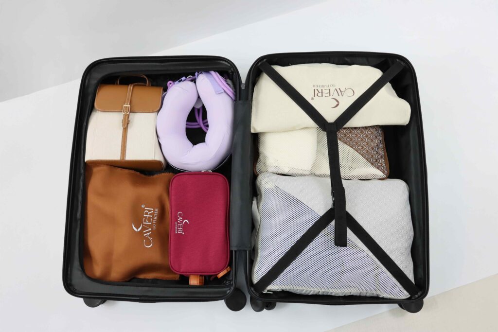 Suitcase packed neatly with Caveri compression packing cubes