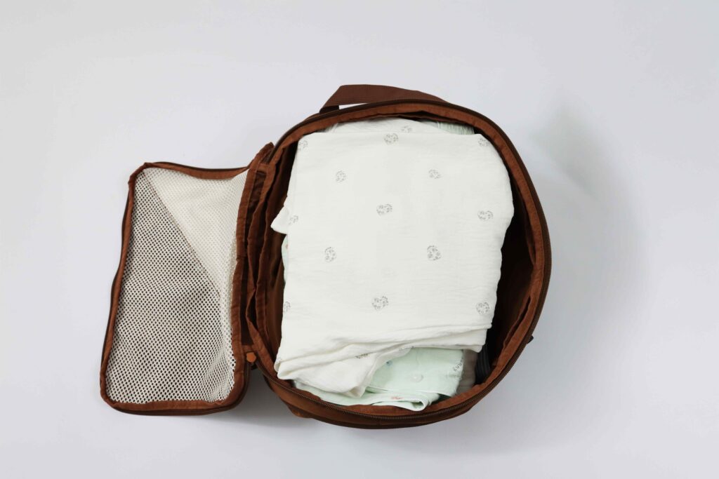 Compression packing cube showing folded clothes inside