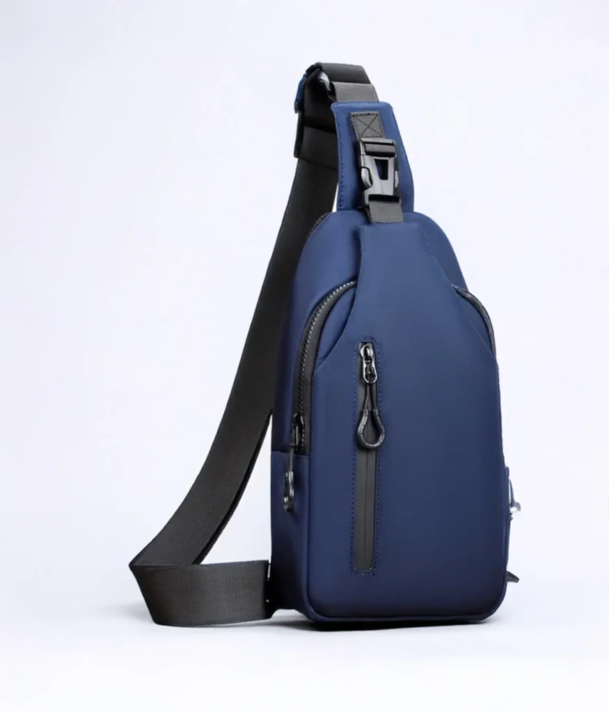 Caveri Jordan Crossbody Sling Bag in navy blue vegan leather with adjustable strap